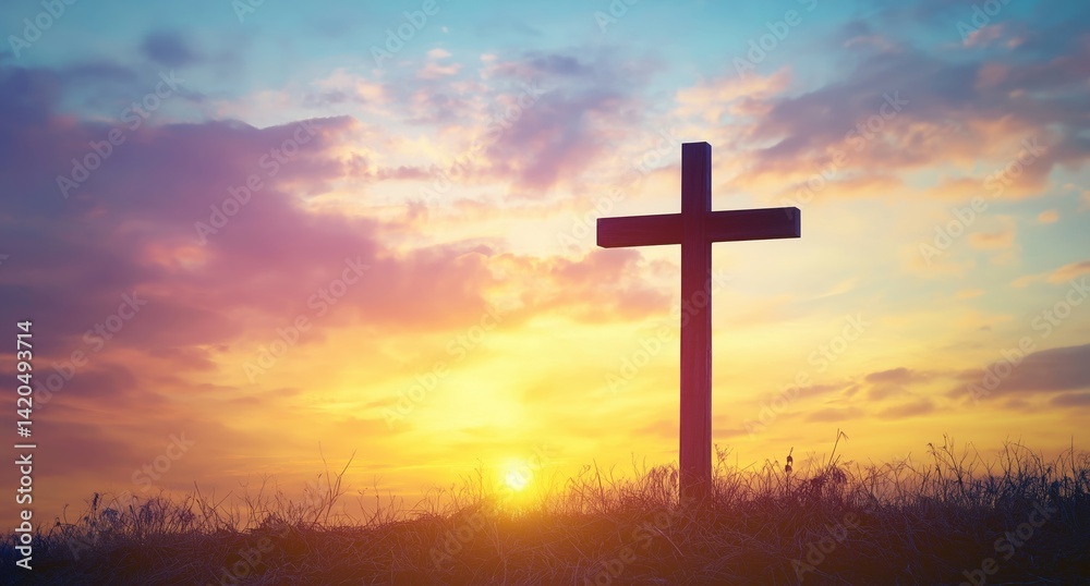 A silhouetted Christian cross stands against a vibrant, colorful sky at dawn or dusk.