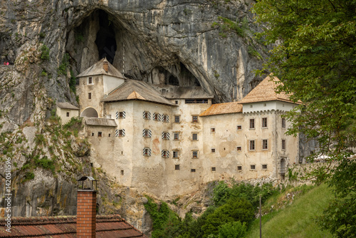 Obraz na płótnie Predjama Castle or Castel Lueghi built within a cave near Postojna. Renaissance castle built within a cave mouth in Slovenia. w salonie