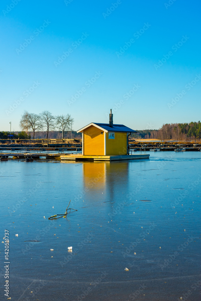 Winter landscape of the frozen Sjotorp Lake, Gota Canal, Sweden