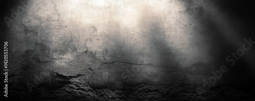 Light beam illuminating grunge concrete wall background
