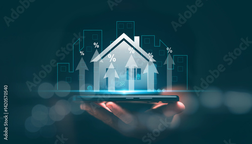 Real estate investment concept, Businessman holding smartphone with percentage of bank interest rate and arrow up. High demand and rising price for real estate. Residential development project.