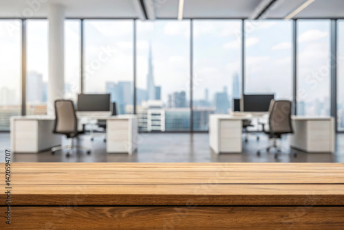 Modern office interior with wooden desk and computer workstation facing large glass windows overlooking the city skyline in a contemporary corporate workspace setting