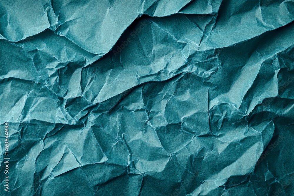 Textured teal crumpled paper background. Textured teal crumpled paper background.