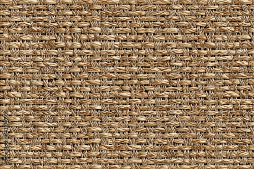 A beige seagrass fabric background presents a natural, textured surface ideal for rustic or coastal themed projects.