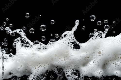 White foam with bubbles on black background