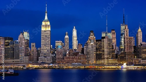 New York City Skyline Glowing at Night with Empire State Building