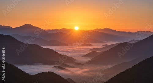Wallpaper Mural Sunrise over mountains with fog in valley creating a scenic landscape view. Torontodigital.ca