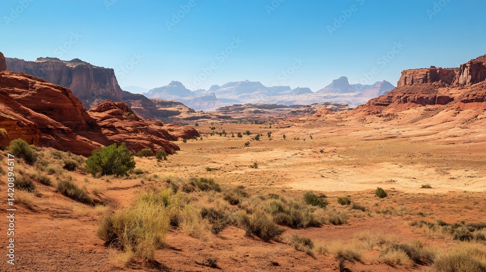 Naklejka premium Panoramic Vista of Utah's Magnificent Red Rock Landscape Under a Blue Sky