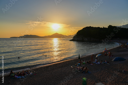 Obraz na płótnie Sunset over Milocer beach near Budva along the coast of the Adriatic Sea in Montenegro w salonie