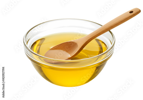 Cooking Oil in Glass Bowl with Wooden Spoon photo