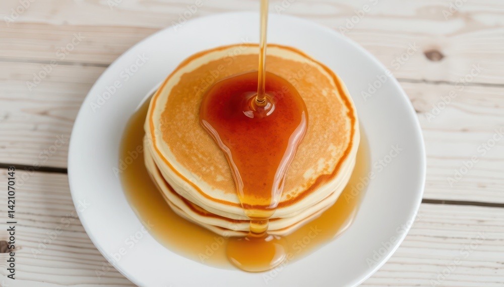 Stacked pancakes drizzled with syrup Stacked pancakes drizzled with syrup