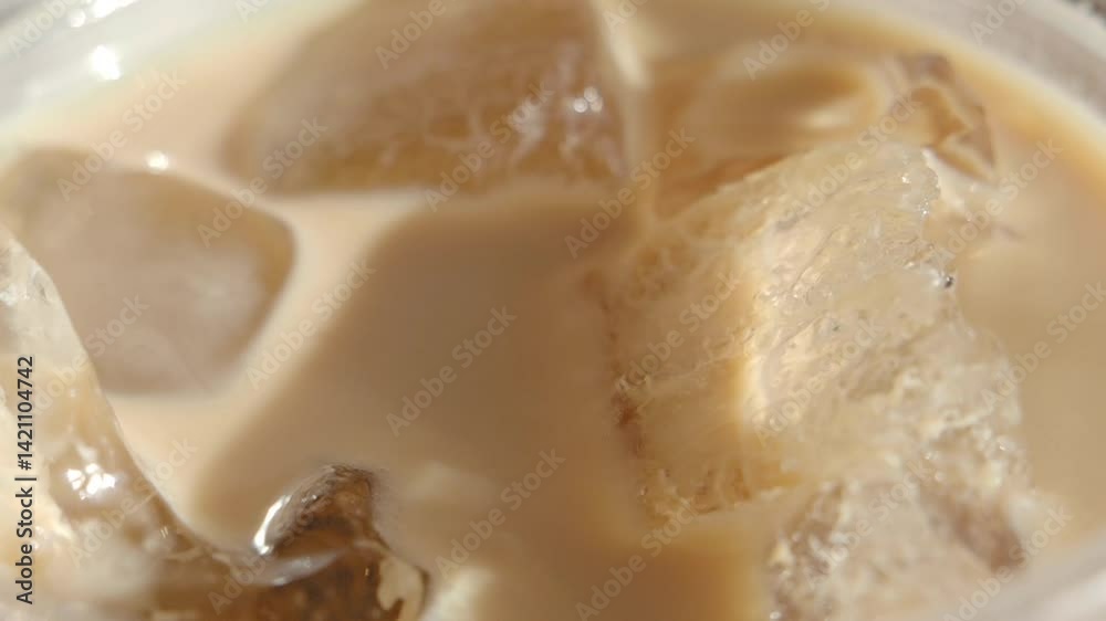 Iced coffee preparation on a warm day at a cafe Iced coffee preparation on a warm day at a cafe
