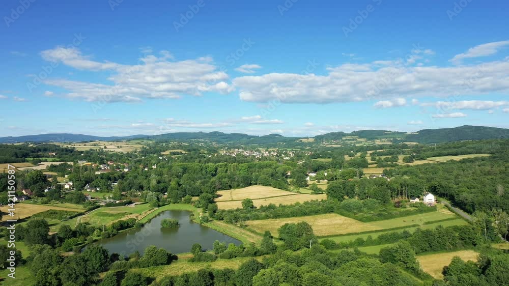 The historic village surrounded by fields near a seaside resort in Europe, France, Burgundy, Nievre, Saint-Honore-les-Bains, near Chateau Chinon, in summer, on a sunny day. The historic village surrounded by fields near a seaside resort in Europe, France, Burgundy, Nievre, Saint-Honore-les-Bains, near Chateau Chinon, in summer, on a sunny day.