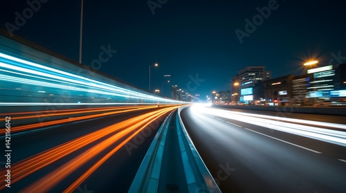 Night city traffic motion blur. Highway lights, fast speed. Urban transportation, modern cityscape. Best for technology, travel, business concepts.