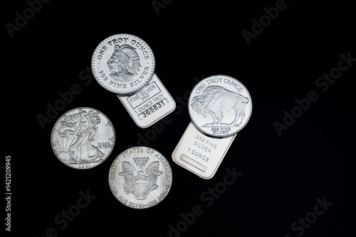 Silver coins and bars 999 precious metal for economy money investing
