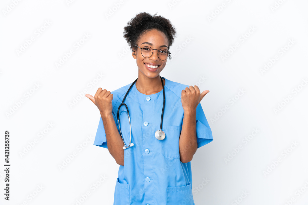 Young surgeon African American doctor woman isolated on white background with thumbs up gesture and smiling Young surgeon African American doctor woman isolated on white background with thumbs up gesture and smiling