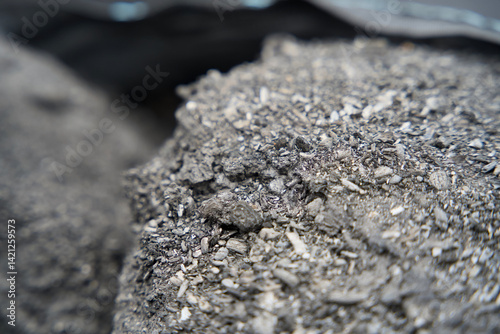 Close-up of biochar, produced through wood pyrolysis, a sustainable solution for carbon sequestration. Ideal for themes around CO2 reduction, climate change, and eco-friendly technology
