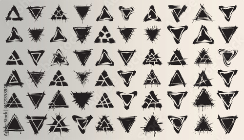 Black grunge strokes in the shape of triangles. Set of 60 pcs.