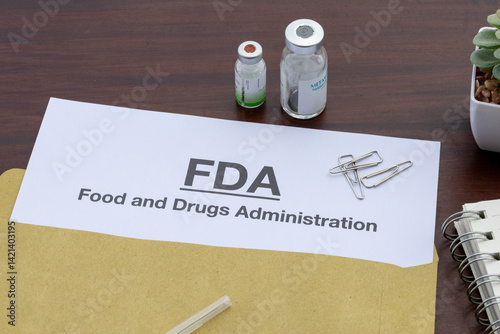 Health Regulation Notice: FDA Document on Doctor’s Wooden Desk photo