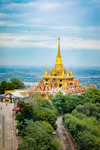Wat Khiriwong, the highlight is the Ubosot and Phra Chulamani Chedi, located on the top of Khao Daowadueng, and offers a high angle view of Nakhon Sawan. It is a beautiful sunset viewing point. photo