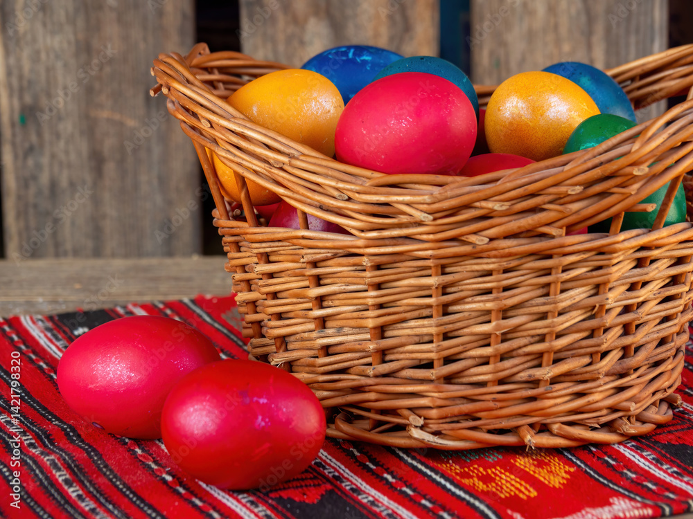 twig basket with colored easter eggs