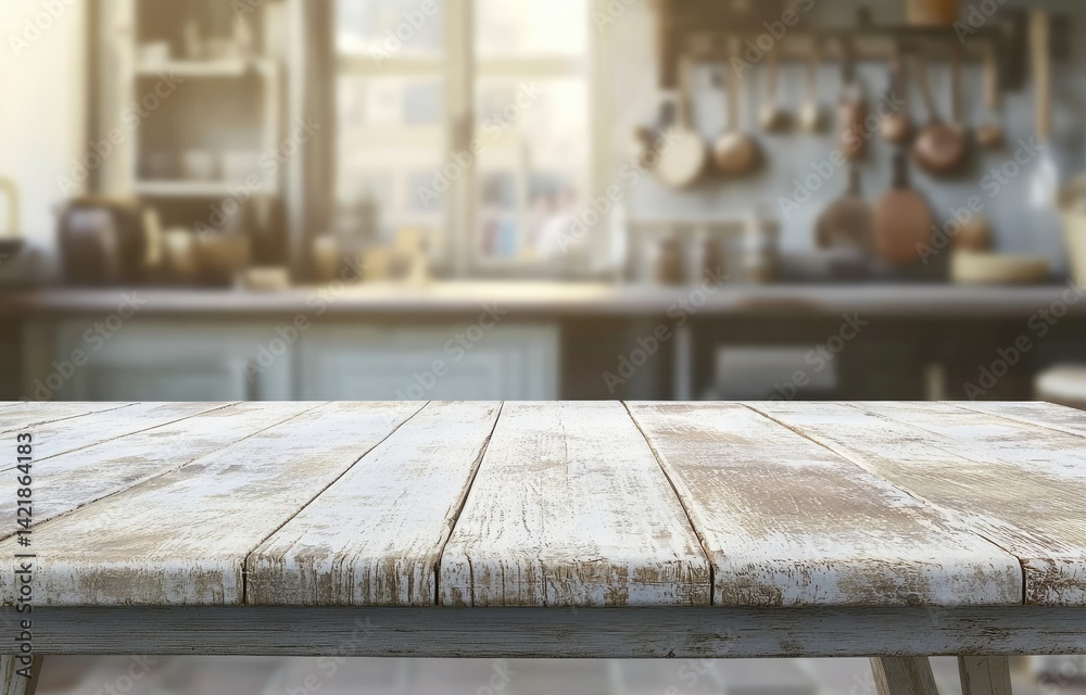 Rustic wooden table in front of a kitchen Rustic wooden table in front of a kitchen