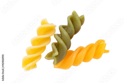Three Colored Dry Fusilli Pasta Pieces with Transparent Background
