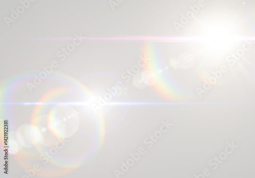 A luminous light source with various rainbow-colored circular lens flares, dynamic effect on transparent background