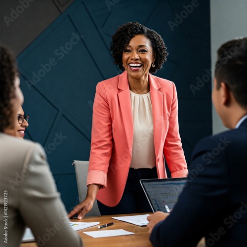Enthusiastic African American Businesswoman Leading a Collaborative Meeting with Diverse Colleagues
