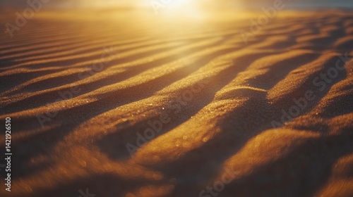 Sunset over desert dunes with long shadows and golden sand patterns, minimal and cinematic 