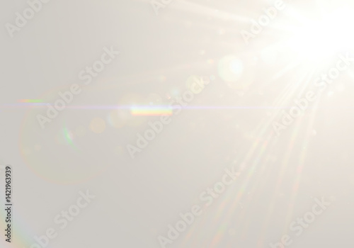 Bright lens flare radiates across with horizontal streaks, subtle rainbow refractions and bokeh effect on transparent background