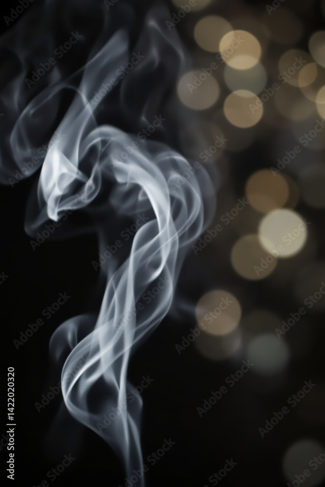 abstract smoke swirls against golden bokeh lights abstract smoke swirls against golden bokeh lights
