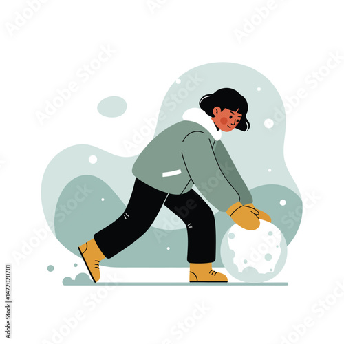 Child in winter jacket rolling snowball for snowman building in snowy weather outdoor activity 