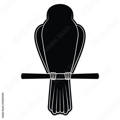  A parrot silhouette perched on a branch,