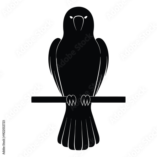  A parrot silhouette perched on a branch,