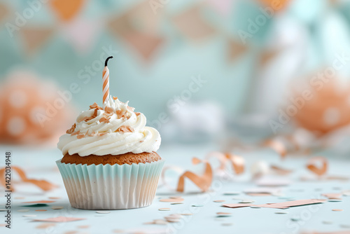 A single vanilla cupcake with smooth white frosting sits centered against a soft pastel background, such as pale peach or dusty blue