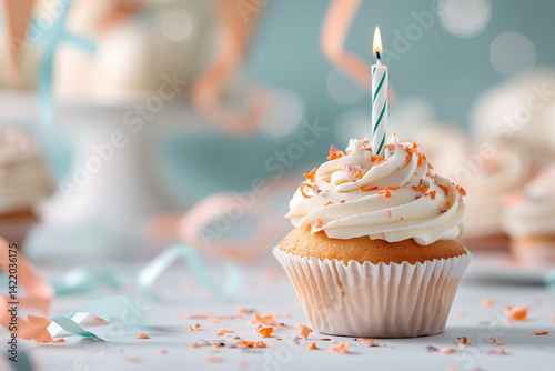 A single vanilla cupcake with smooth white frosting sits centered against a soft pastel background, such as pale peach or dusty blue