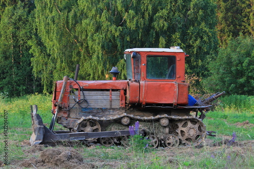 old soviet agricultural tractor for plowing land