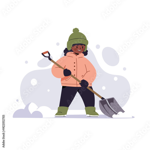 Child shoveling snow in winter clothes with green hat and peach jacket outdoor in snowy weather 