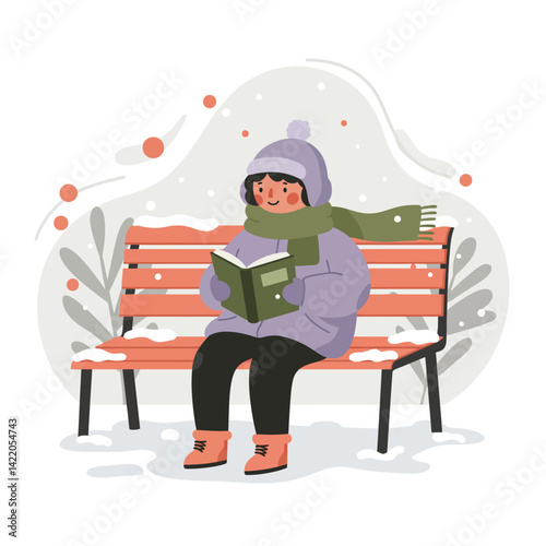 Child sitting on bench reading book in winter snow wearing warm hat scarf and boots 