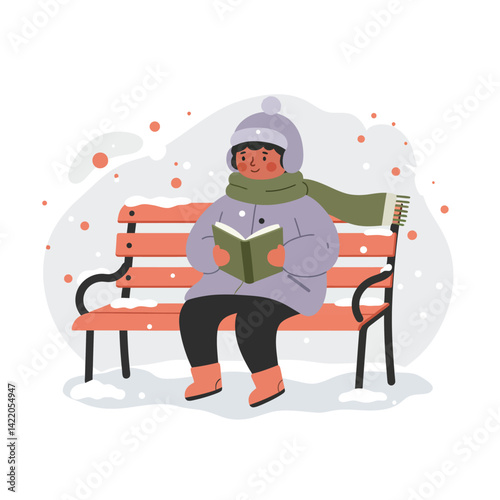 Child bundled in winter clothes sitting on park bench reading book during snowfall in cold season 
