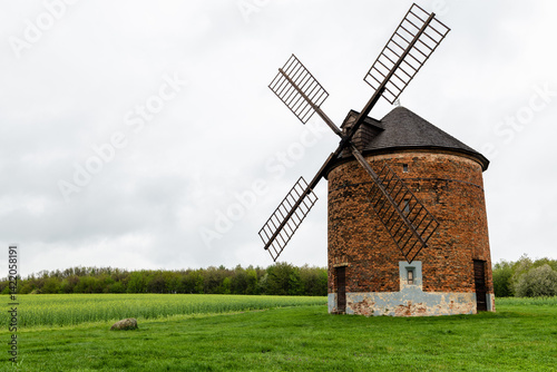 Obraz na płótnie chvalkovice windmill among flowering trees in springtime w salonie