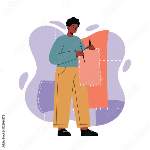 Young person holding scissors cutting fabric pieces for sewing or crafting project in creative environment