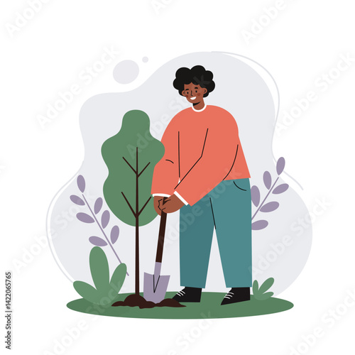 Young person planting tree in garden with green plants and purple foliage natural growth activity