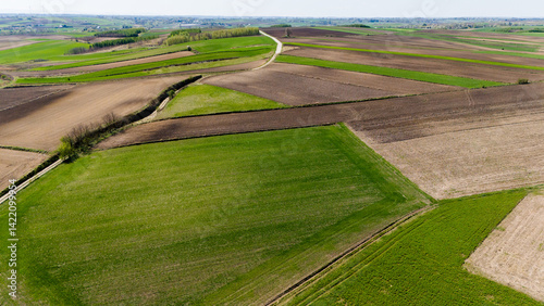 Obraz na płótnie drone footage of rural farm fields in full color.. w salonie