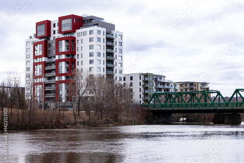 
Side view of the 1916 steel Lavigueur Bridge over the Saint-Charles River in the Pointe-aux-Lièvres sector seen during a cloudy morning, Quebec City, Quebec, Canada