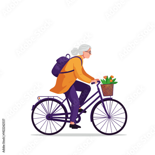 Elderly woman riding a bicycle with flowers in basket  