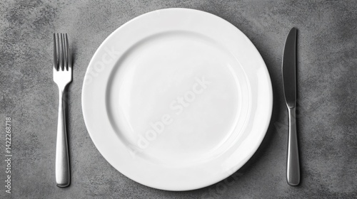 Preparing for a culinary experience empty plate kitchen table food photography modern setting close-up dining concept photo