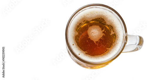 Overhead shot of refreshing beer in glass mug with frothy foam