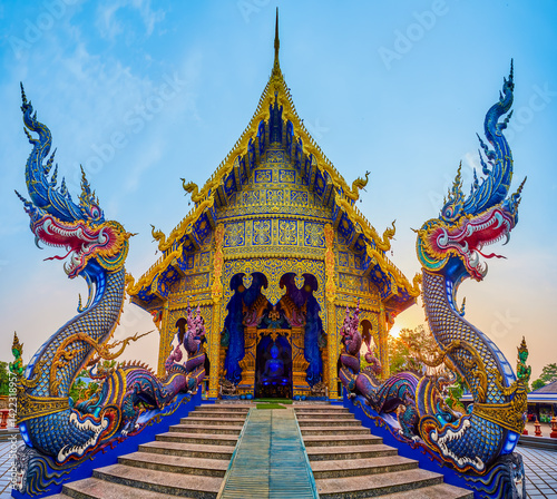 Obraz na płótnie Two Naga serpents in Wat Rong Suea Ten (Blue Temple), Chiang Rai, Thailand w salonie